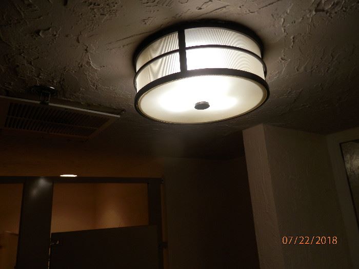 Nice Iron and glass fixture (2)  *******$20each******** Call Now for immediate appointment.  (760) 975-5483    (760) 445-8571