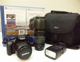 Canon EOS Rebel T3/1100D camera, zoom lens,   430 EX11 Speedlight, and case
