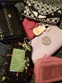 A bevy of purses, bags, fobs, wristlets, etc.......