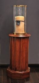 Round mahogany pedestal with Ralph Lauren hurricane lamp