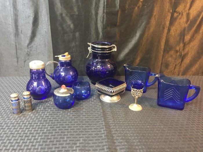 Cobalt blue glassware with metal accents