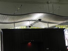 Titanium "Floating" Sound Dampening Ceiling Panels.