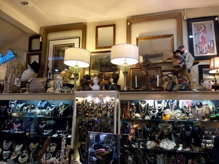 Picture Frames, Unique Artwork, Lamps, Decorative Figurines oversee the loaded Jewelry Cabinets...all these treasures are waiting for YOU!