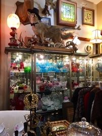 Colorful Glasswear, Vintage Lamps, Wall Art, Home Decor, Taxidermy and the Beloved Store Sentry.