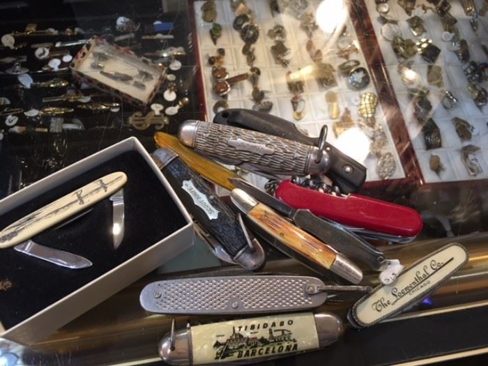 Scrimshaw pocket knives, collectible pocket knives