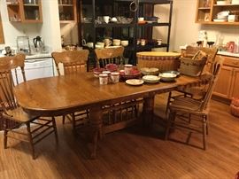 Oak table with five chairs. Extends to 96-inches