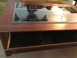 #23	Glass Top w/drawer display coffee table  50x30x17	 $100.00 	