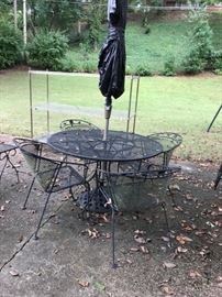 #72	Black Wrought Iron Table w/4 chairs   48x29	 $100.00 	