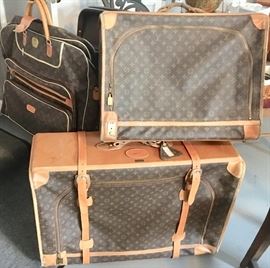 Louis Vuitton luggage. Well used. 