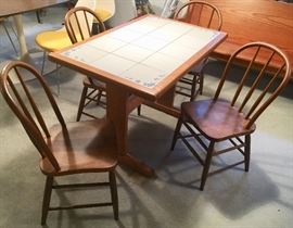 Ceramic top rectangle kitchen table with 4 chairs. 