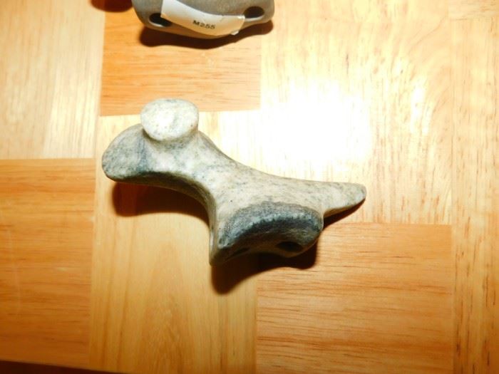 Antique bird stone artifact