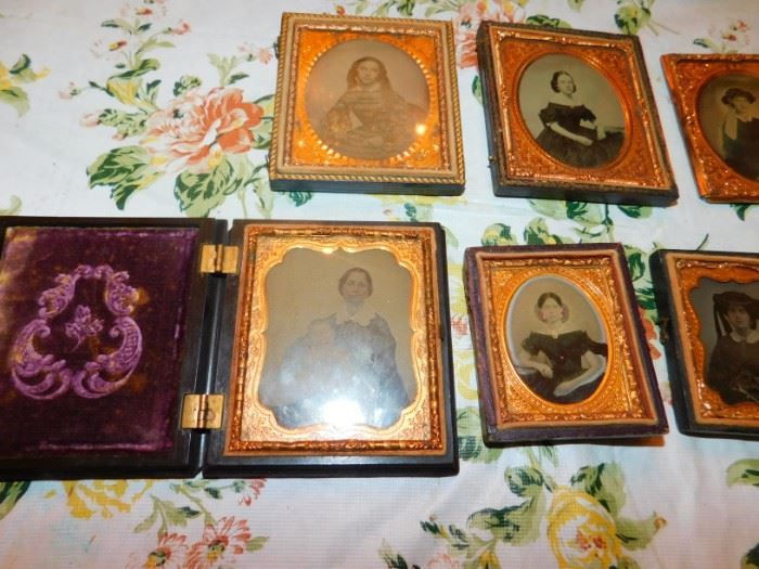 collection of miniature framed portraits