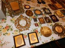 collection of miniature framed portraits