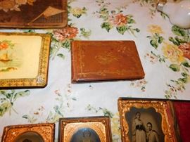 collection of miniature framed portraits