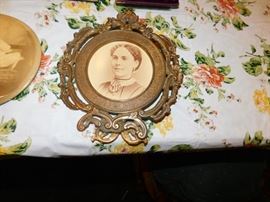 collection of miniature framed portraits