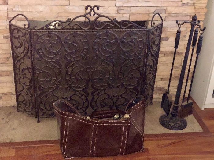 Iron fire screen with leather fire log holder 