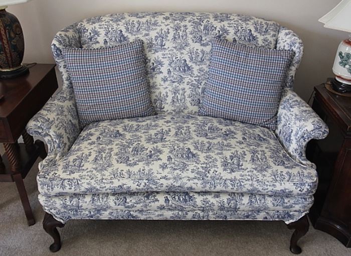 settee covered in pretty blue and white upholstery - great smaller size!