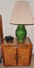 Woven bamboo nighstand. Green ginger jar lamp