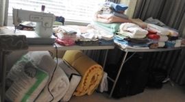 Assorted linens and luggage
