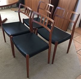 Four teak mid-century chairs #79 by J.J.Moller - designed by Niels Moller. Vinyl seats. Great condition!
