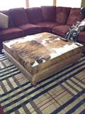 Cowhide and leather ottoman