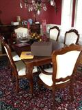 Thomasville formal dining table with 2 leaves and 6 chairs, like new with matching sideboard