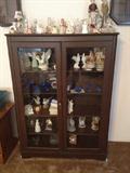 Contents are for sale, cabinet is Not for sale.  Blue Bird of Happiness collectibles, crystal, bells, figurines etc.