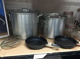 2 Aluminum Gumbo/Soup Pots 
2 Cast Iron Skillets
