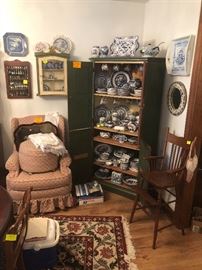 painted wood cabinet, blue willow dishes and serving pieces, upholstered chair and ottoman, antique high chair, small wooden curio cabinet, spoon collection