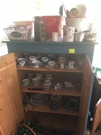 tea cup and saucer collection, kitchenware, 2 door wooden cabinet