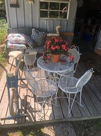 wrought iron table and chairs, retro exercise bike