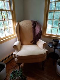 Wing chair in  yellow. 