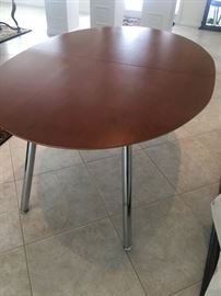 Italian walnut wood table- 66" has leaf to extend to 90"