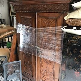 Carved Indonesian armoire