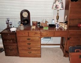 HANDSOME ETHAN ALLEN DESK, ALONG SIDE (RIGHT) AND IS A SEPERATE PIECE IS AN ETHAN ALLEN BOOKCASE. TO THE LEFT IS A SMALL WOOD FILE CABINET WITH KEY (WE HAVE TWO AT THIS SALE)