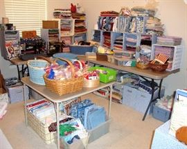 THERE IS A TREMENDOUS AMOUNT OF FABRIC, SEWING & QUILTING SUPPLIES, ETC AT THIS SALE!!!! THIS PHOTO IS JUST BARELY SCRATCHING THE SURFACE OF WHAT IS PRESENT. IF YOU ARE A QUILTER, LIKE TO SEW or YOU ARE AN ARTS & CRAFTS PERSON THEN "DO NOT MISS THIS SALE"