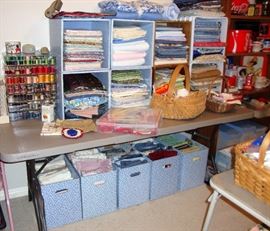 THERE IS A TREMENDOUS AMOUNT OF FABRIC AT THIS SALE!!!! THIS PHOTO IS JUST BARELY SCRATCHING THE SURFACE OF WHAT IS PRESENT. IF YOU ARE A QUILTER, LIKE TO SEW OR AN ARTS & CRAFTS PERSON THEN "DO NOT MISS THIS SALE"