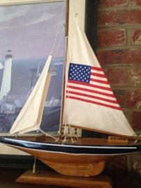 A sailboat proudly showing the stars & stripes