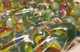 Green Glass Multi-Color Cat Eye Marbles with 2 Boulders.