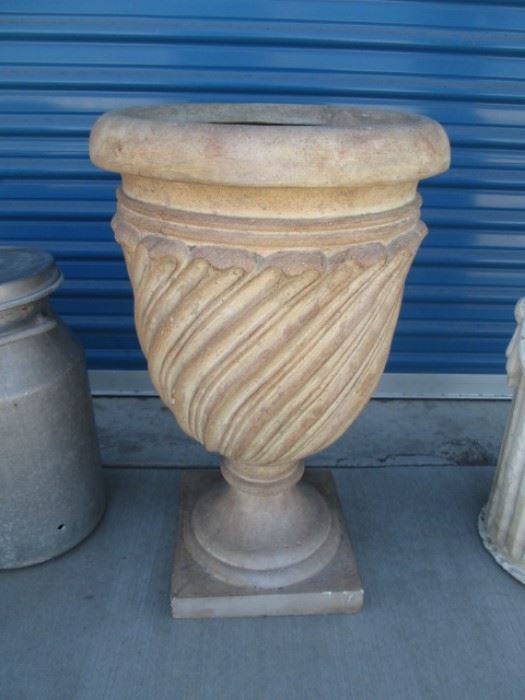 Beautiful pottery planter on pedestal for outdoor planting