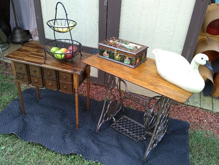 Upscaled vintage tables made from antique sewing machines. Wire fruit stand, foreign wood painted box, large swan.