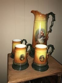 Antique steins and pitcher