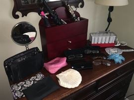 glasses, curling irons, clutch bags