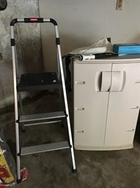 Step ladder and Rubbermaid cabinet