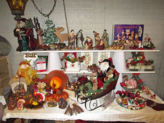 Holiday decor, 2 Nativity sets, Santa collectibles, sleigh, etc.