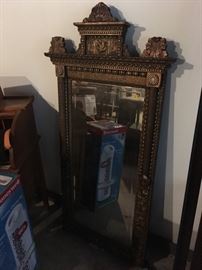 Large Victorian Mirror with intricately carved burnished gold frame
