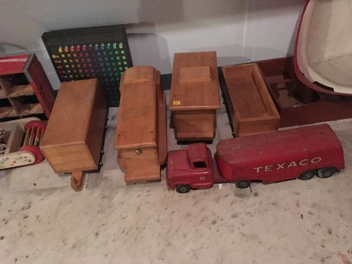 Set of 4 handmade wooden Traincars and an antique Texaco Truck. You can trust your car to the man who wears the star...