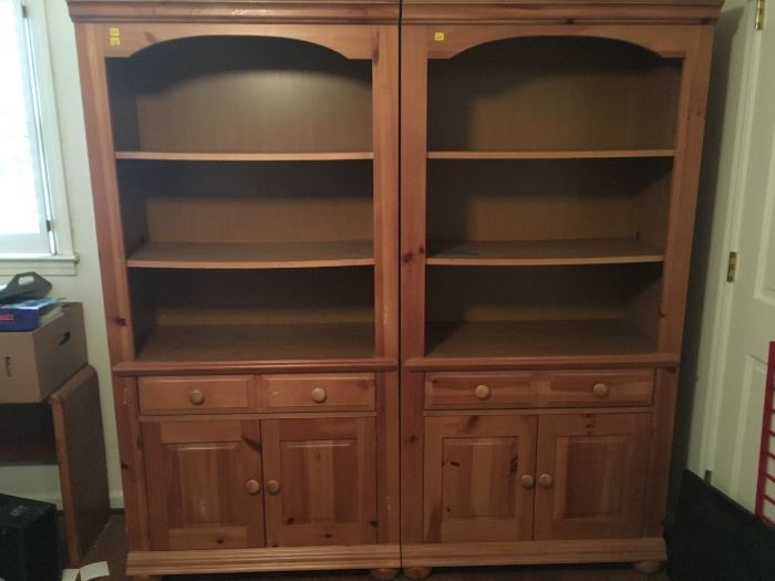 Pair of matching pine Broyhill Bookcases with storage below. 