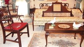 one of many vintage chippendale style chairs, great coffee table and chinese rugs