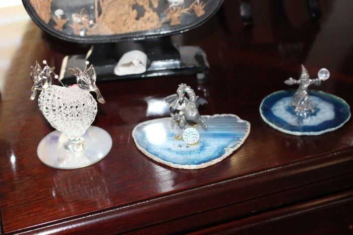 Crystal  and dragon pewter figurines on geode plates